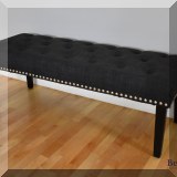 F14. Home Meridian upholstered bench with nailhead trim. 